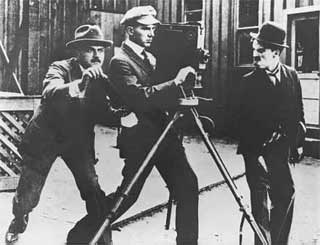 Chaplin razzing the director